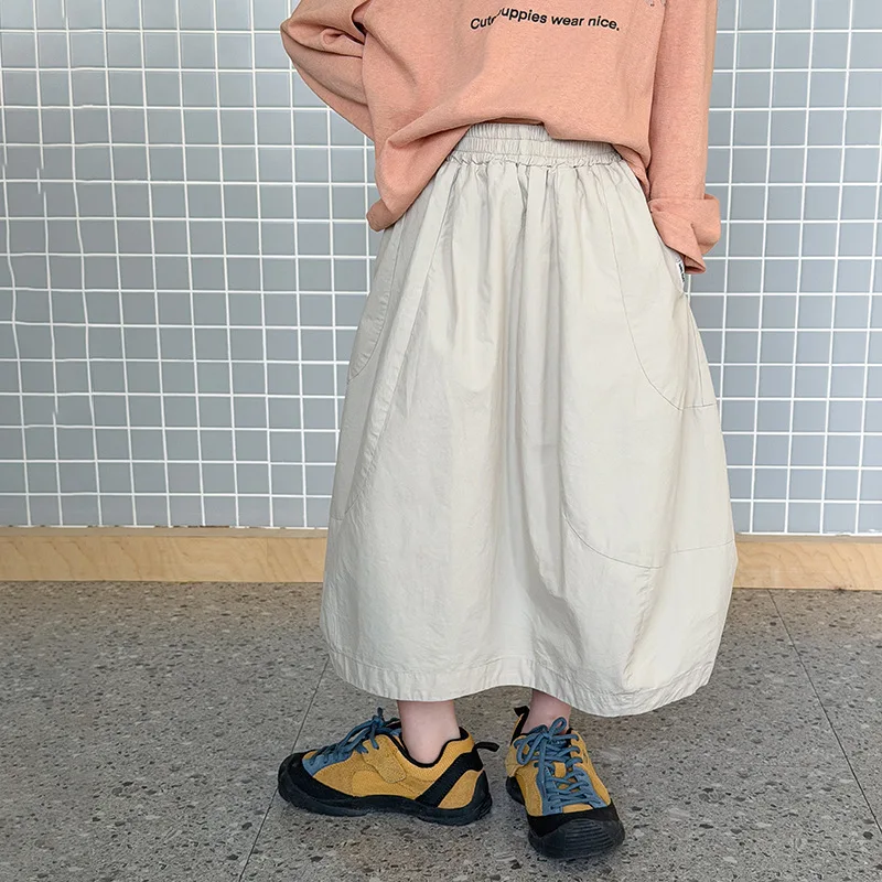 봄 여름 새로운 스타일 아동용 스커트 소녀용 한국식 심플하고 우아한 부드러운 마이크로 꽃봉오리 하프 스커트 코튼 범 스커트