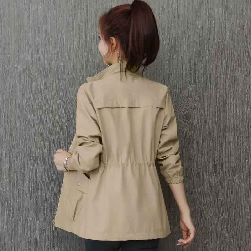 

2023 Autumn and Winter Women's Standing Neck Zipper Pocket Lace up Panel Loose Casual Fashion Elegant Commuter Long Sleeve Coat