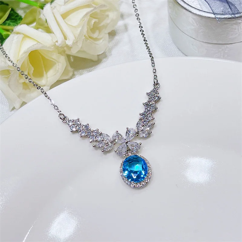 

Роскошный Серебряный Ангел ожерелья крылья для женщин сапфировый синий цвет овальный камень кулон Свадебная вечеринка ожерелье подарки на годовщину