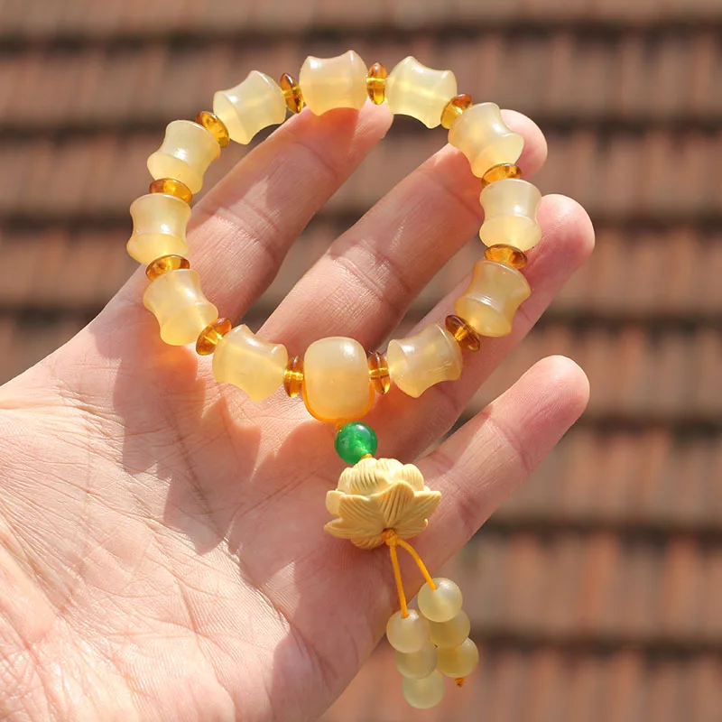 

Natural Tibetan Bamboo Horn Bracelet Buddha Beads With Carved Huang Yangmu Lotus Pendant Bracelets For Men And Women