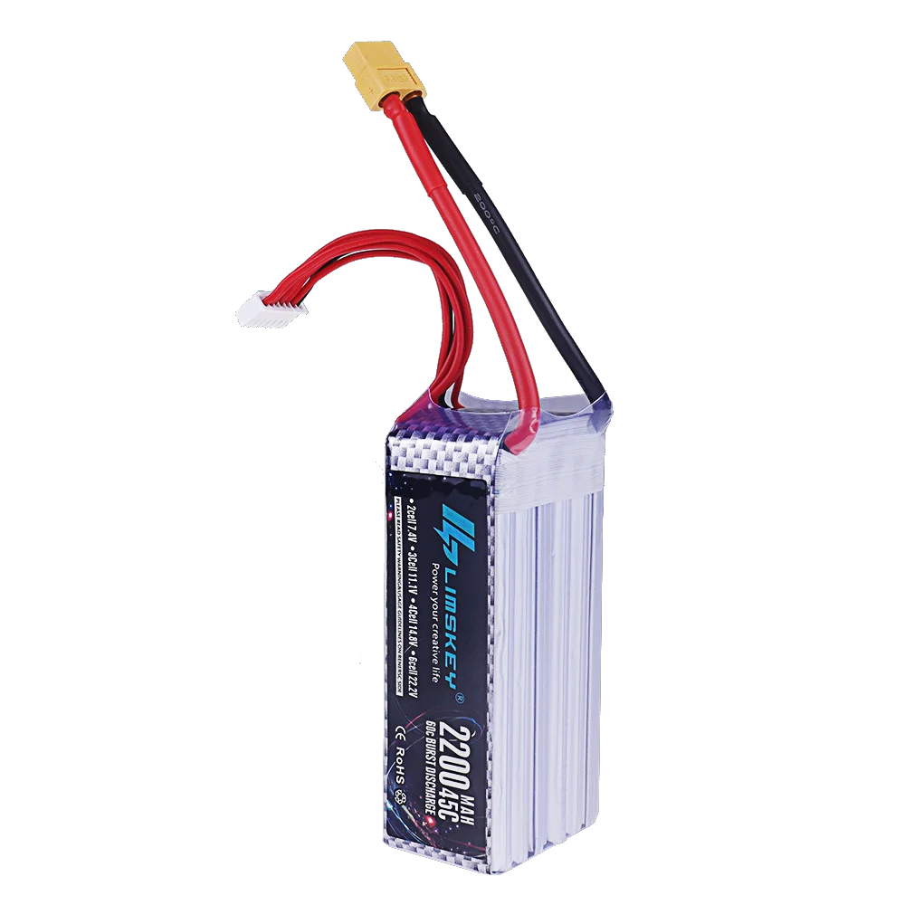 Batterie drone 6S LiPo 2200mAh posée sur fond neutre, profil fin.