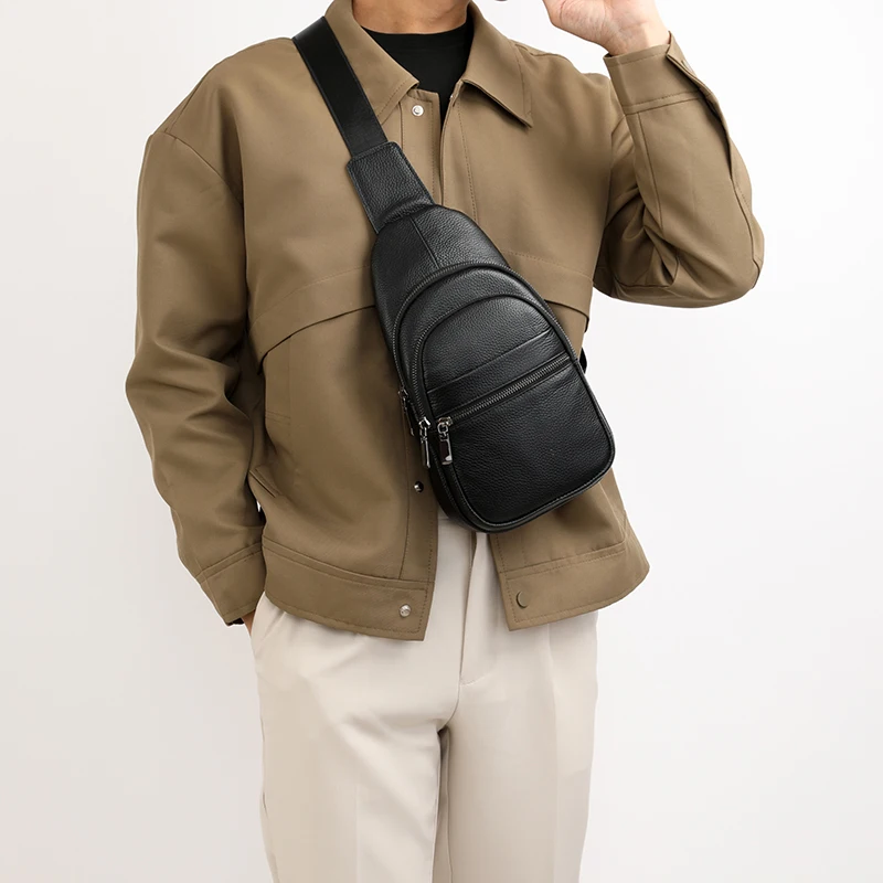Stylish genuine leather sling bag for men with multiple compartments, ideal for everyday carry or travel