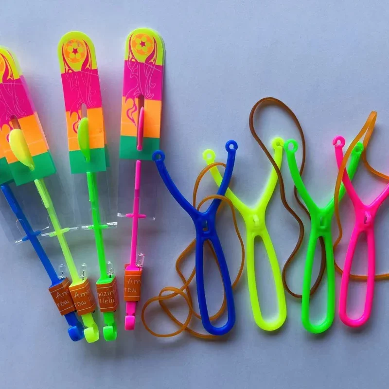 Magic Light Toy Arrow Rocket Helicopter Slingshot Outdoor Flying Toy LED Light Rubber Band Catapult 50pcs party photo props