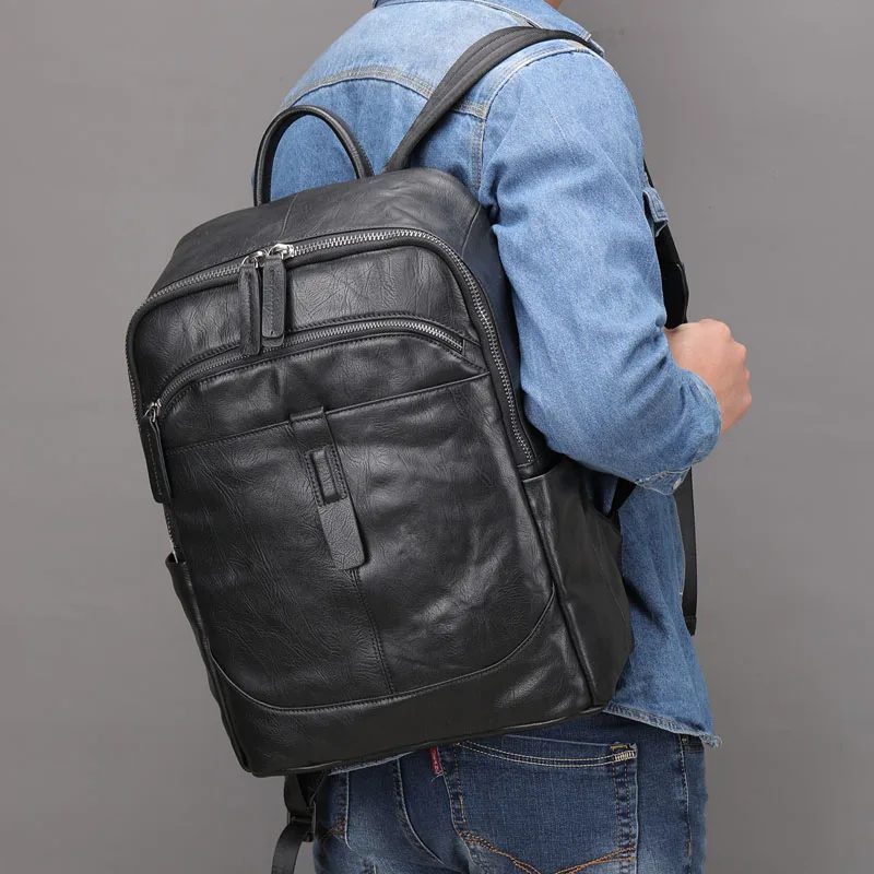 

EUMOAN New men's leather backpack simple lightweight travel bag business leisure large capacity computer bag cowhide school bag