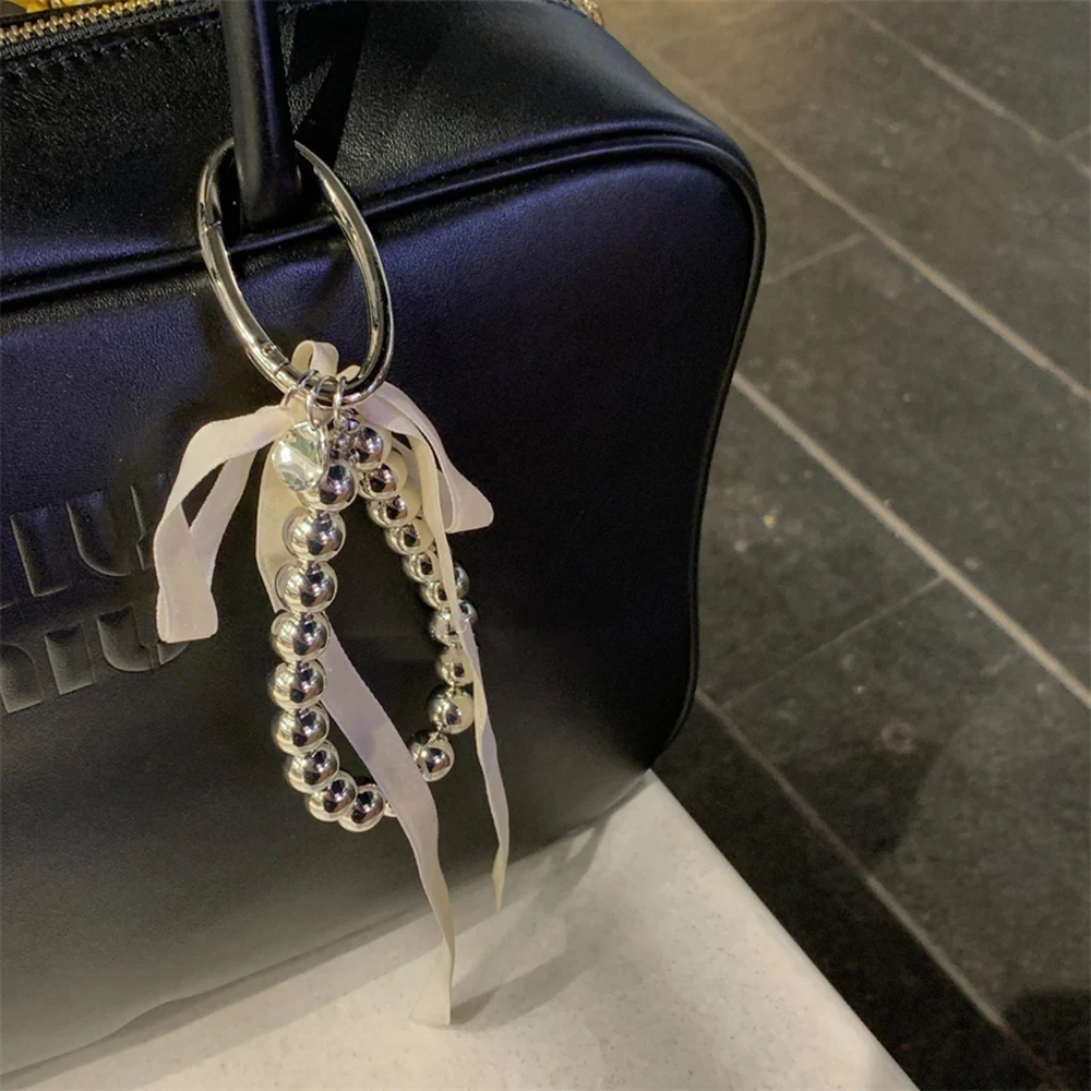한국어 리본 Bowknot 슬리버 페르시 전화 매력 스트랩 Keycord 아이폰 카메라 가방 체인 펜던트 소녀 Jewely 교수형 코드 로프