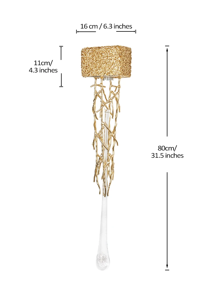 Introducing the Luxury Vertical Wall Light, featuring a gold frame and clear glass pendant design. It boasts a textured cylindrical shade and an elongated glass stem, making it perfect for vertical orientation. This exquisite piece effortlessly enhances any space with its touch of sophistication. Dimensions are provided for convenience.