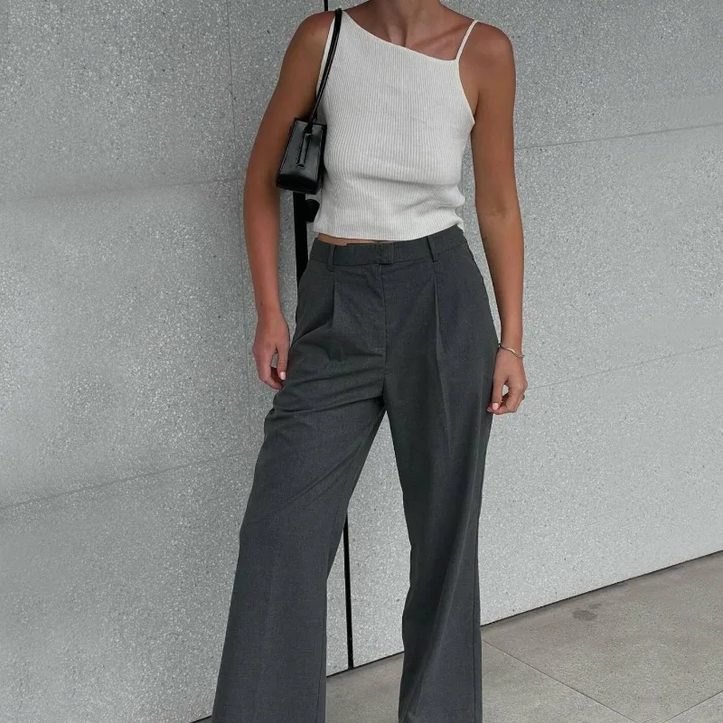 Camiseta negra de moda acanalada para mujer, jersey de espagueti, informal, de retazos, sin mangas, verano 2025, top ajustado para mujer