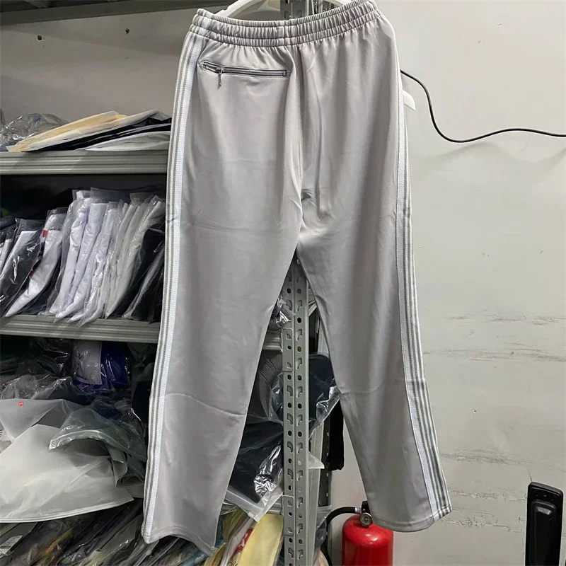 

23SS New Fasion Gray Needles Track Pants Men Women Poly Smooth sweatpants Butterfly Logo Knitted Stripe Trousers Haikyuu