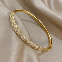 Bracelets de luxe torsadés en Micro incrusté de Zircon pour femmes, à la mode, en cuivre plaqué or, empilés, bijoux cadeaux 3
