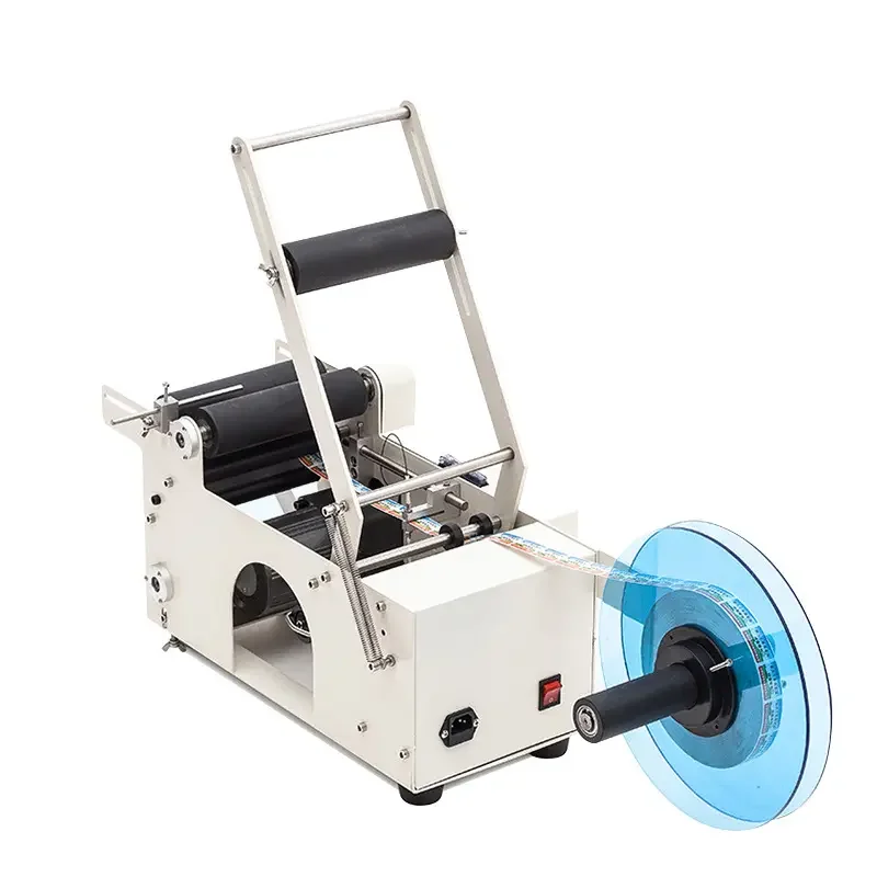 

Manual Jar Wine Round Bottles 603 Can Shampoo Label Pasting Labeling Machine
