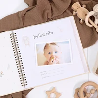 ERATOPIC Baby Memory Keepsake Book - Linen Fabric with Golden Logo and Milestone Stickers