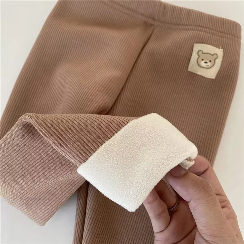 Coreano Otoño Invierno nuevos niños Leggings de una pieza Unisex niños niñas bebé frío evitar caliente dibujos animados elásticos pies atados pantalones - Imagen 6