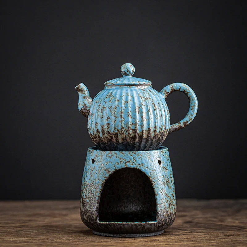 https://ae01.alicdn.com/kf/Scfc9b161e3bb46a4b52db845e23c60051/Vintage-Warm-Tea-Maker-Teapot-Heating-Base-Ceramic-Candle-Tray-Holding-Furnace-Warmer-Wine-Boiled-Tea.jpg