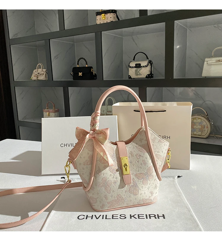 حقيبة حمل جلدية محمولة للنساء، تتميز بطباعة زهور ر...