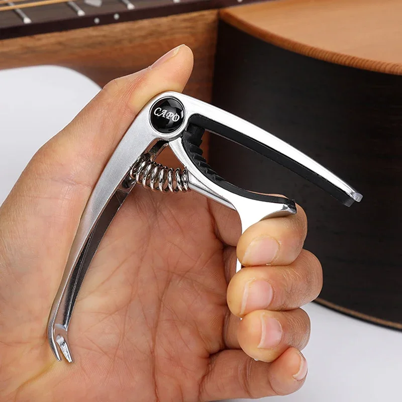 Description Picture 4 of itemMiwayer Aluminum Alloy Guitar Capo Metal Guitar Tuner Picks Holder Professional Capo for Acoustic Electric Guiter Ukulele Bass