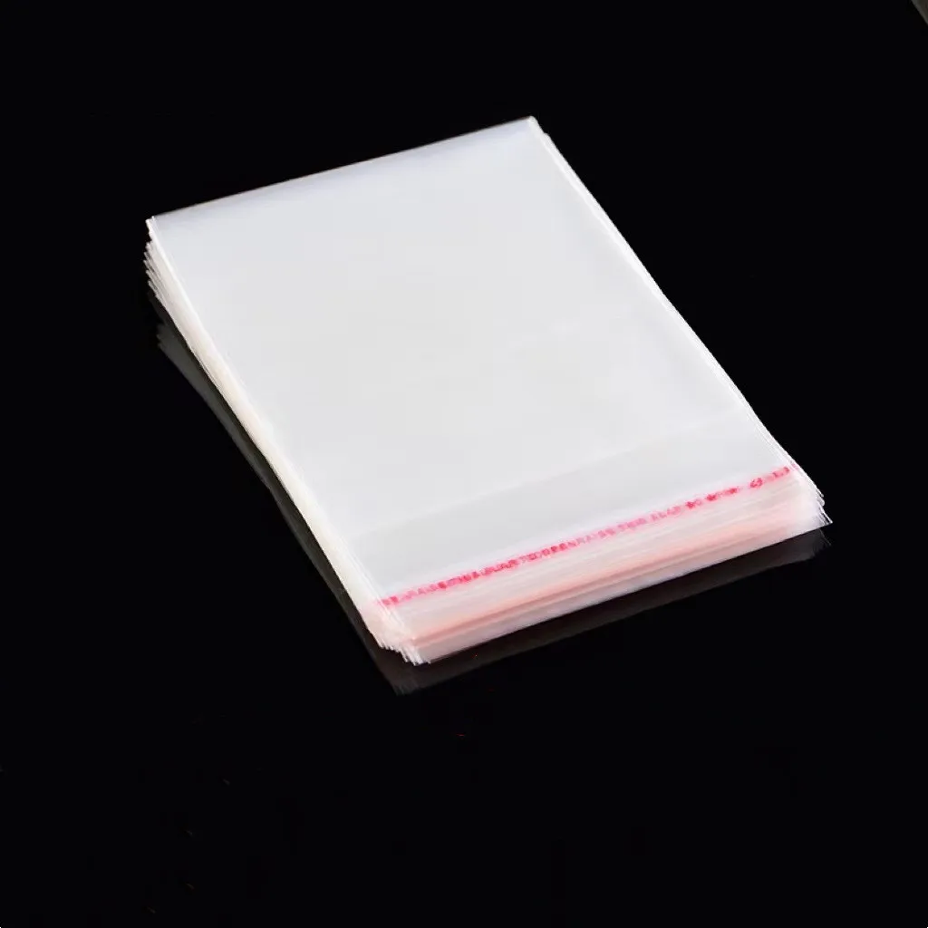 100pcs transparent OPP self-adhesive glass paper bag, self sealing packaging bag for candy, biscuits, toys and party gifts 2