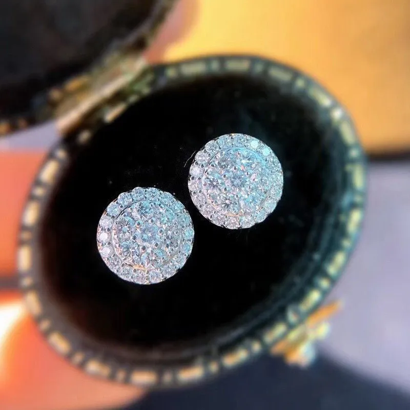 Earrings side view showing flower design