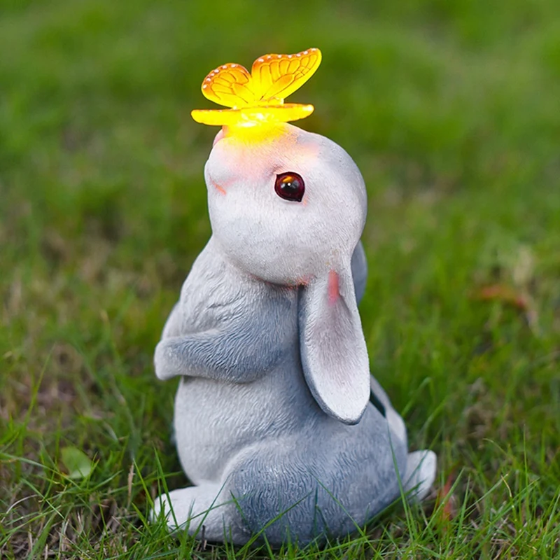 

Садовые статуи-кролик с солнечной бабочкой