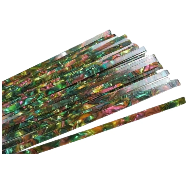 

30STRIP GREEN SHELL CELLULOID BINDING,Measures6mm x 1.5mm thick and 1600mm long