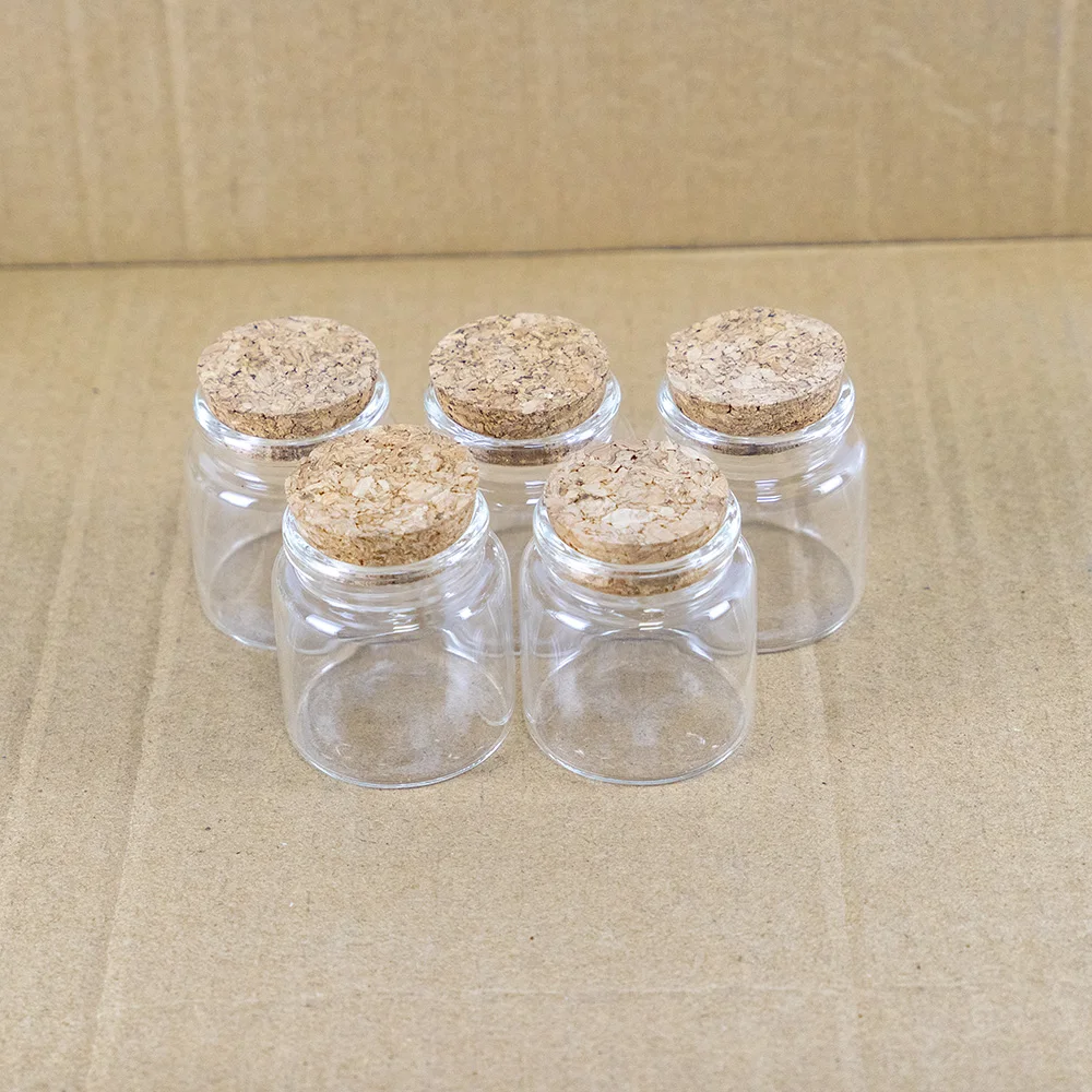 https://ae01.alicdn.com/kf/Sd01a307dbaa7404eb51ef94afdc202b0e/12pcs-Lot-47-50mm-50ml-Glass-Bottles-With-Cork-Spicy-Storage-Tiny-Bottle-Jar-Containers-Glass.jpg