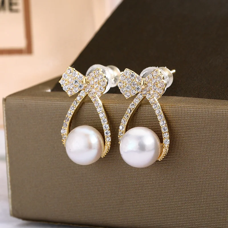 Bow & Faux Pearl Decor Stud Earrings  Christmas gift jewelry, Ear jewelry,  Earrings