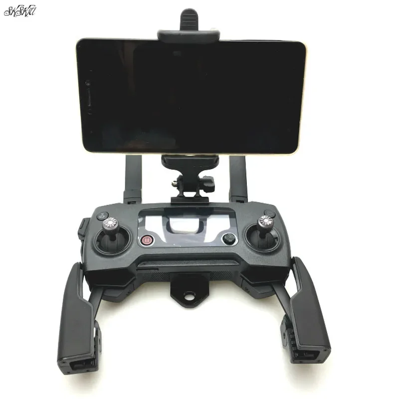 Support téléphone 50-85mm installé sur radiocommande DJI Mavic SE, smartphone en place, prêt pour le vol.