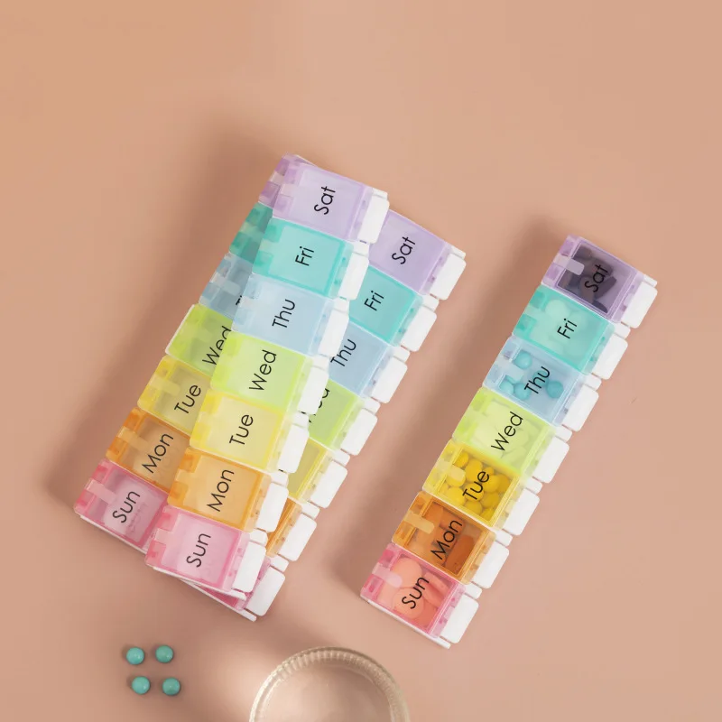 

Portable Portable 7-segment Rainbow Bounce Button Pill Box 7-day Colorful Travel Compartment Pill Storage Box