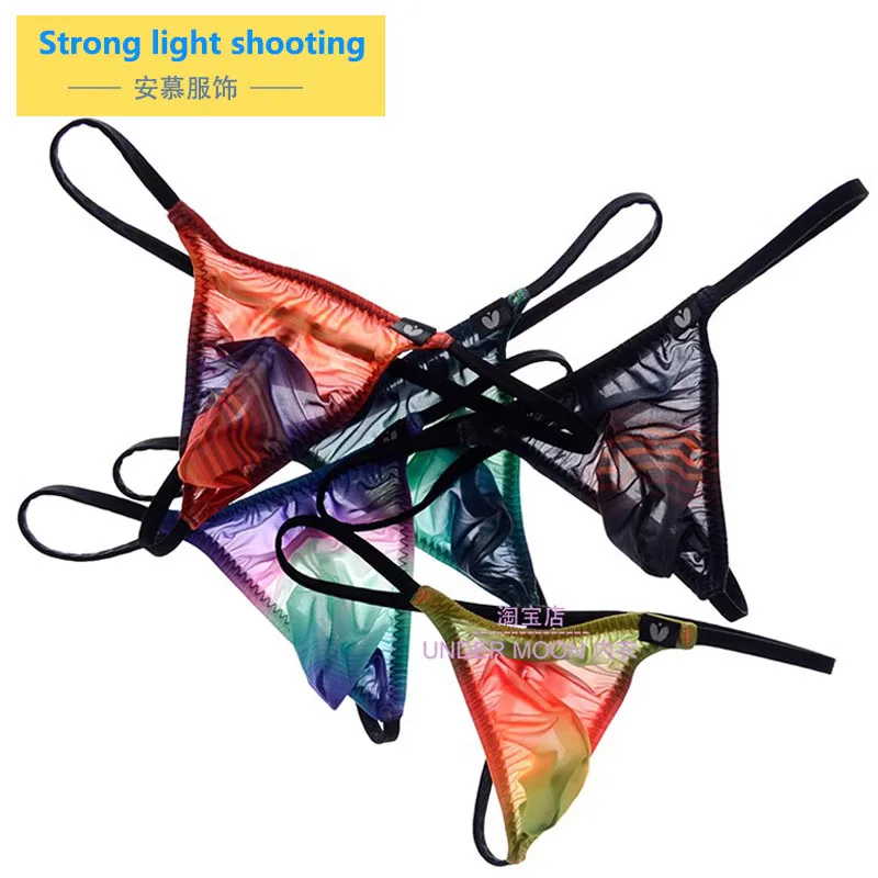 

Low waist sexy men's T-pants gradient printing elastic thong men's mini panties thin ice silk comfortable.