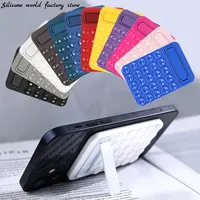 Silicone World Multi Functional Silicone Suction Cup Mobile Phone Desktop Stand Anti-Slip Back Sticker Holder Glass Wall Stand 1