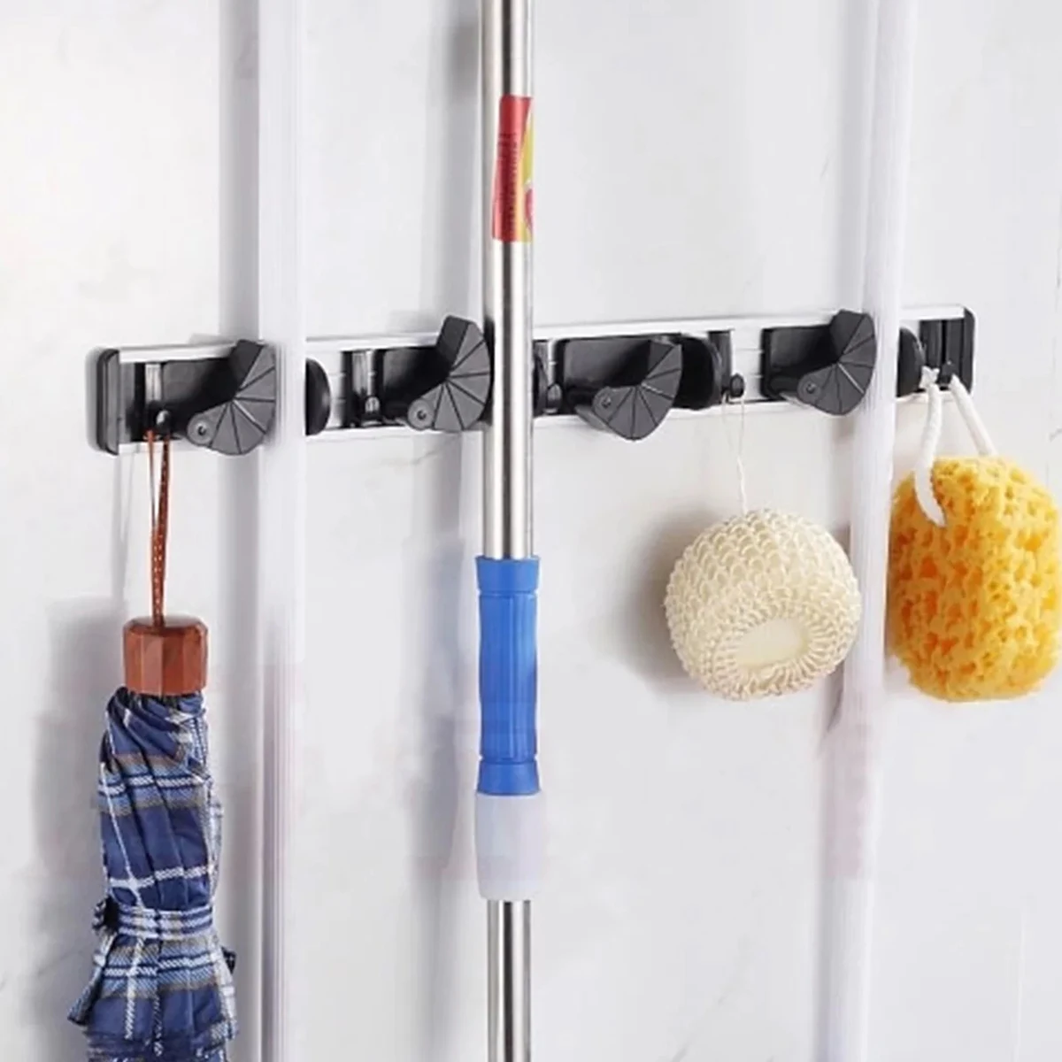 https://ae01.alicdn.com/kf/Sd08ea2e9dddf442093053c249f26c0ce5/Mop-Broom-Holder-Wall-Mounted-Broom-Hanger-4-Slot-5-Hooks-Anti-Slip-Mop-Broom-Rack.jpg