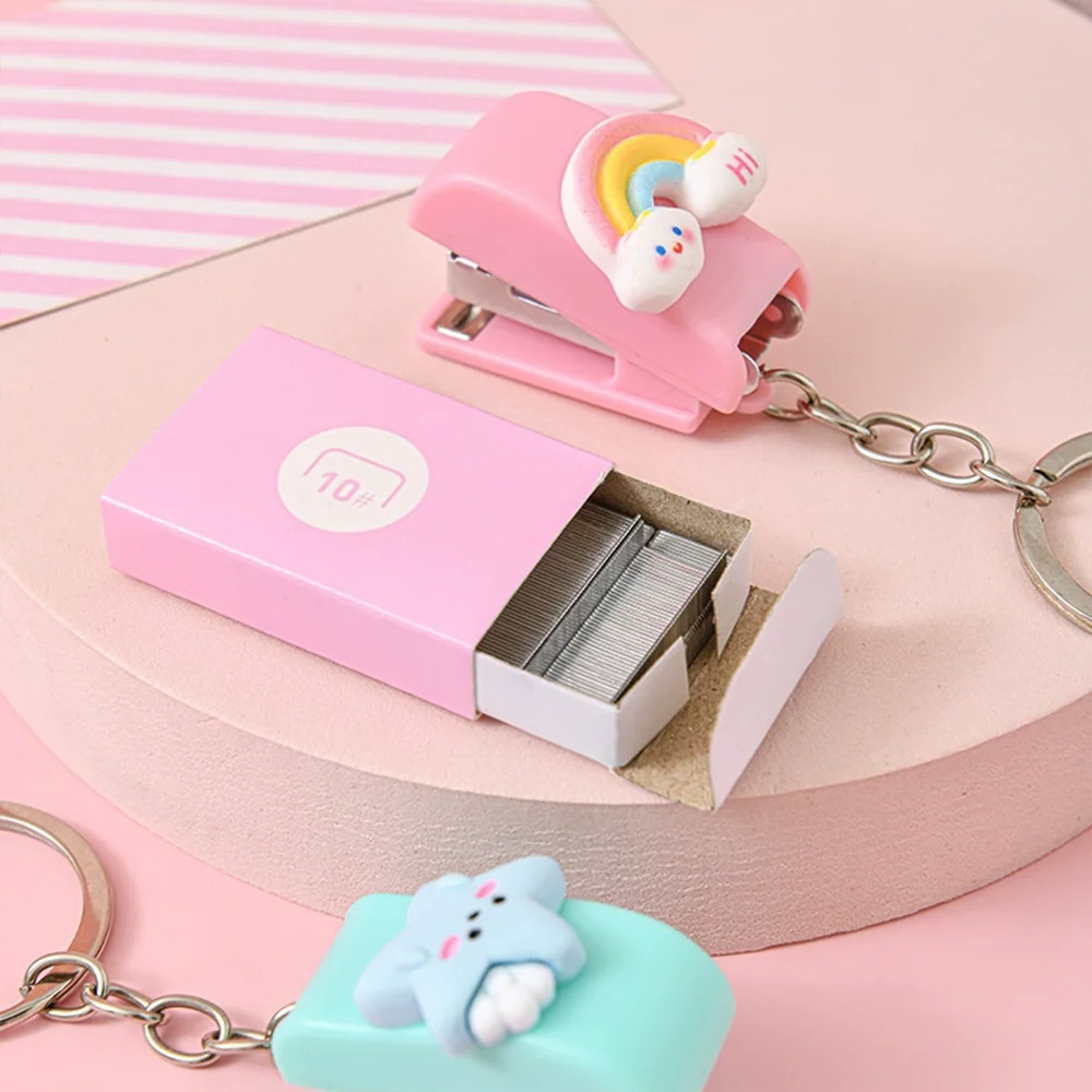 1pc Pink/white cartoon student mini stapler, small and portable, can be used as a keychain, with size 10 staples