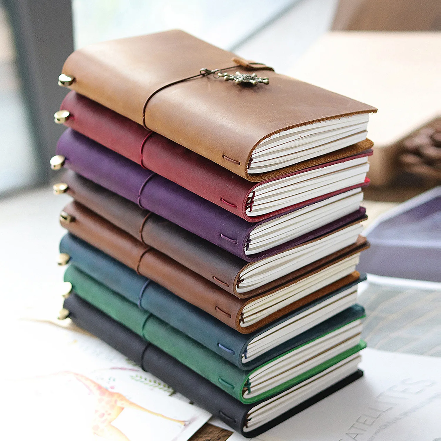 Vintage Refillable Crazy Horse Leather Travel Journal with Antique Metal Charms and Elastic Closure