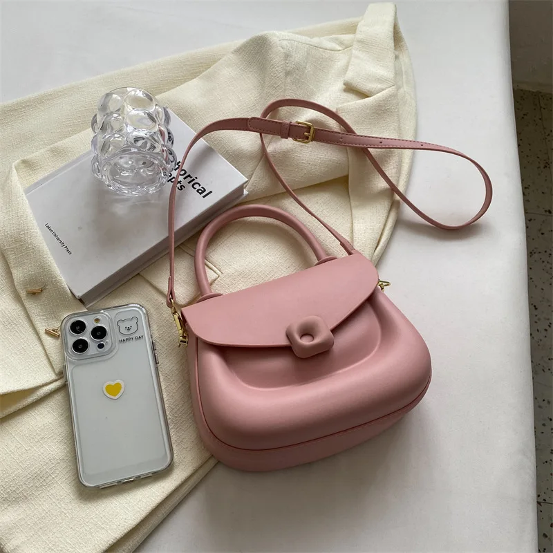 Candy colored bag 2024 spring/summer new women's high-end texture niche design casual handheld one shoulder crossbody saddle bag