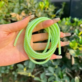 1 ม้วน 1.6m เลเซอร์สี USB ชาร์จข้อมูลป้องกันสายเคเบิล Anti-break ฤดูใบไม้ผลิเชือกป้องกันสายไฟเชือกหูฟัง Bobbin Winder 13