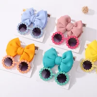Set Sonnenbrille und Haargummi