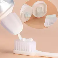 Toothpaste Squeezer Holder Reusable Automatic Closing Flower Shape Silica Gel Self Closing Toothpaste Cap 2