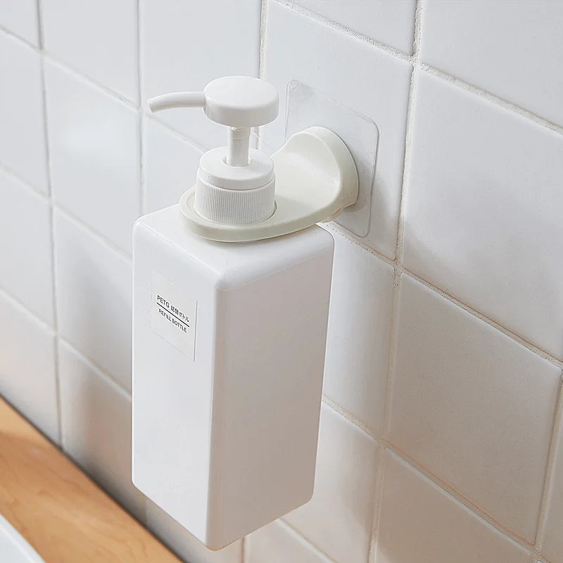 Distributeur gel hydroalcoolique mural vu de profil, support plastique robuste avec capuchon transparent.