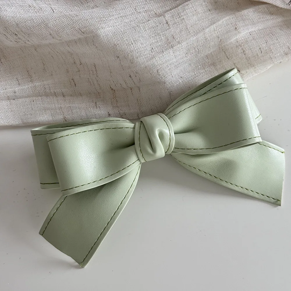 Reine Farbe Weiches Leder Süße Mädchen Bogen Haarspangen Haarnadel Frühling Clip Bang Clip Seite Clip Haar Zubehör Neue – Detail 10
