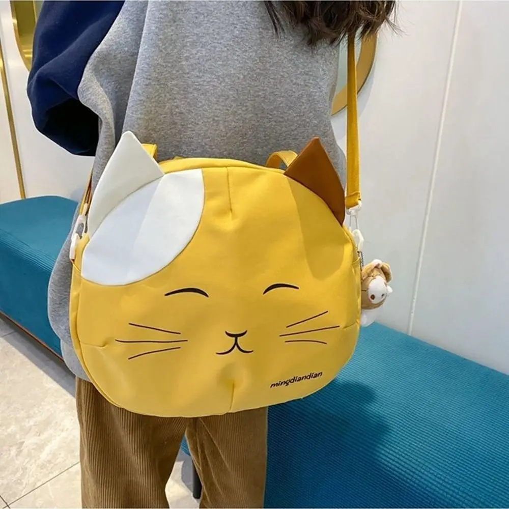 183368-fd27cf.jpg Sd15013184deb4e0faabd39bc925ccf9bH Canvas Nylon Prints Cat Messenger Bag Cute College Style Large Capacity Crossbody Bag Portable Shoulder Bag Handbag Streetwear Mallzona