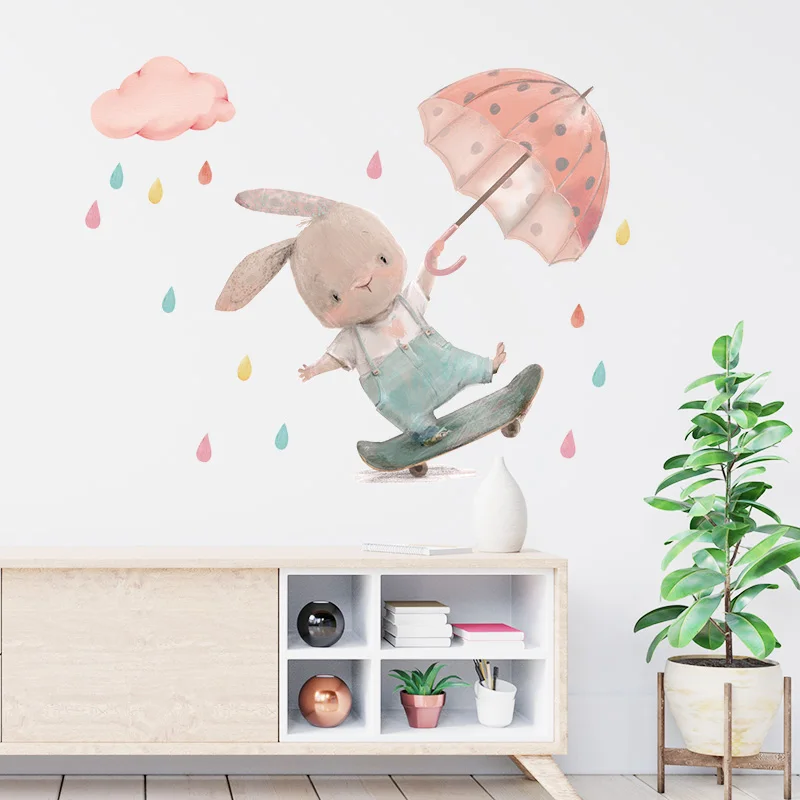 Süßer Hasenjunge auf Skateboard mit Regenschirm-Wandaufkleber Babiesdecor.myshopify.com