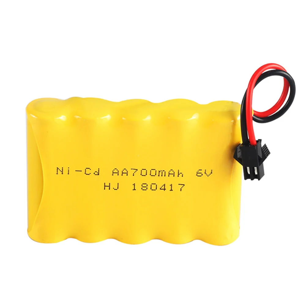 Batterie RC Ni-CD 6V 500-1800mAh posée sur une surface, prête à l'emploi pour voiture bateau tank