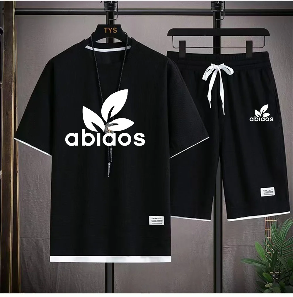 

Мужской новый летний повседневный комплект, комплект из двух предметов с круглым вырезом, коротким рукавом и длинными брюками, с принтом клевера, Модный повседневный комплект