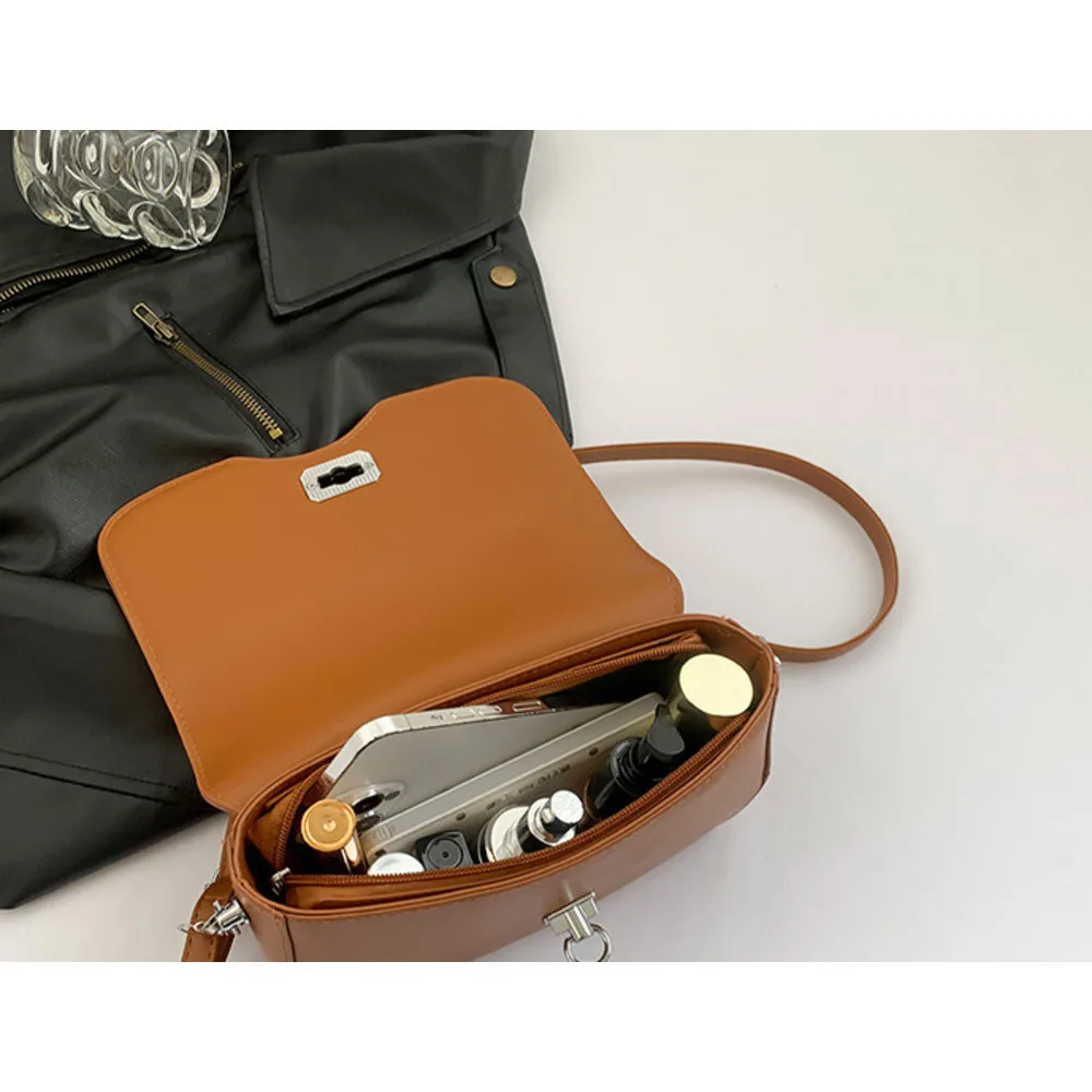 Bolso de hombro de color liso con diseño de axila coreana, sencillo y moderno, con diseño diagonal, para mujer, novedad de verano de 2024_voghion.com