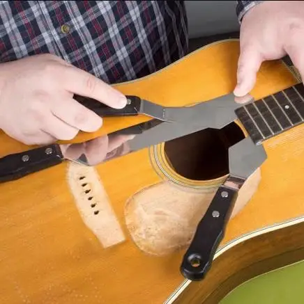 Acoustic guitar repair Professional instrument repair disassemble flat