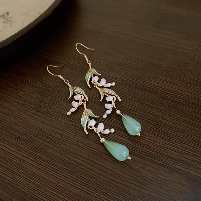 Sd17a354d8b994c098c92ced7d93f3905R Elegant White Orchid Flower Earring for Women Ladies Temperament Metal Leaves Long Tassel Drop Earrings Hook Jewelry Accessories Mallzona