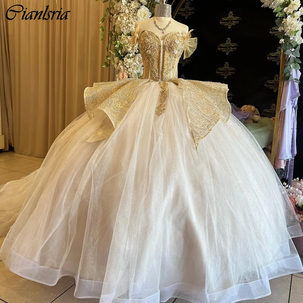 

Gold Illusion Crystal Beading Quinceanera Dresses Ball Gown Off The Shoulder Bow Ruffles Corset Vestidos De 15 Años