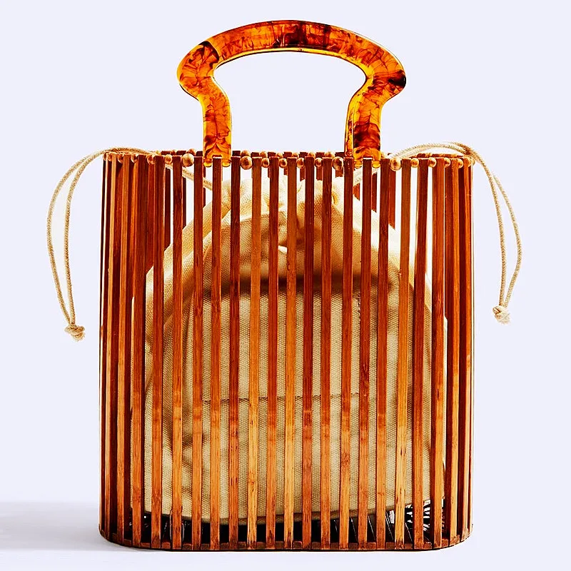 

INS Hot Selling Woven Women's Handbag In Europe and America Fashion Beach Grass Woven Bag Simple Acrylic Handheld Bamboo Package