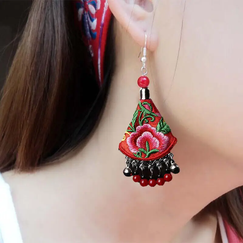 Pair of ruby and diamond pendant earrings (Paio di orecchini pendenti in rubini e diamanti
