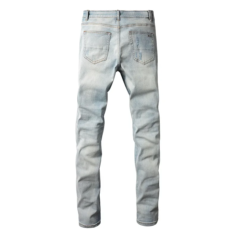 streetwear magro, calça jeans stretch cônico, calças rasgadas azul claro