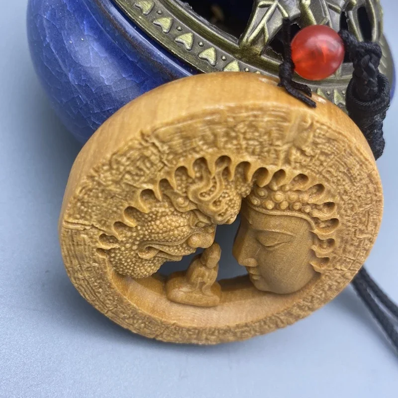 

A read between Buddha and magic sandalwood carved pendant play solid wood car pendant carved arts and crafts to play with pieces